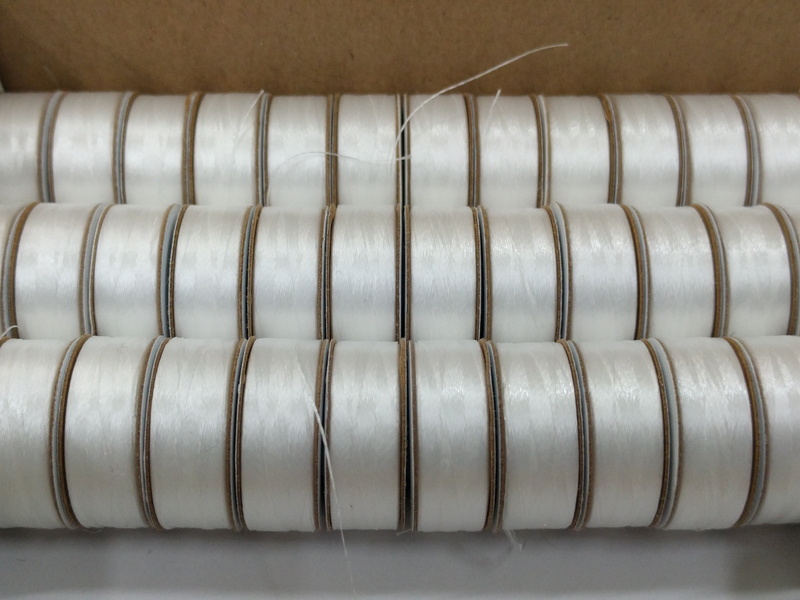 in a row, business, no people, metal, thread, large group of objects, industry, pattern, equipment, abundance, order, silver colored, hanging, factory