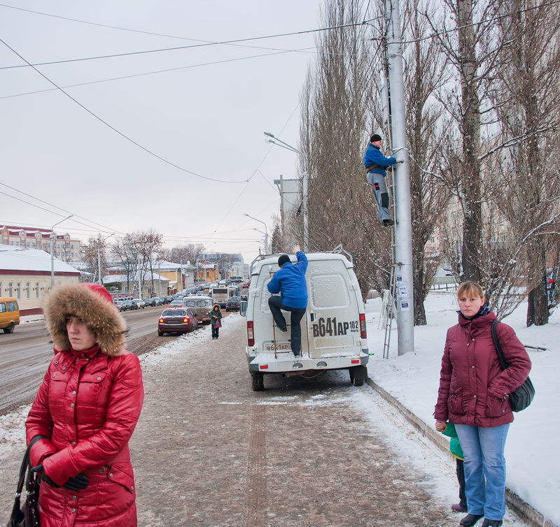 grey, winter, day, motor vehicle, bare tree, worker, man, clothing, group of people, gray, electricity, car, telecommunicatio, building exterior, women