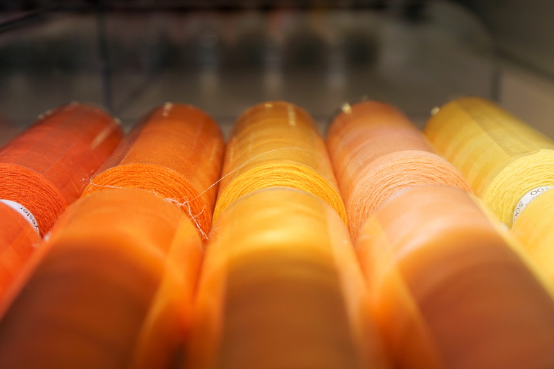 sewing accessories, schneider, freshness, domestic room, bobbin, french food, shelf, business, orange color, haberdashery, fadenrolle, coil, yellow, Colorful