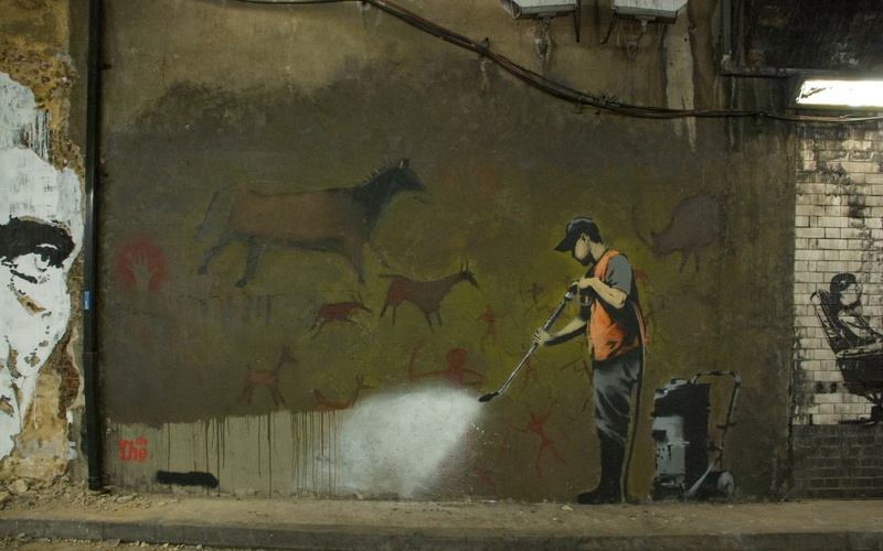occupation, house, one person, rear view, day, art, building exterior, Banksy, street, working, lifestyles, wall - building feature, building, casual clothing