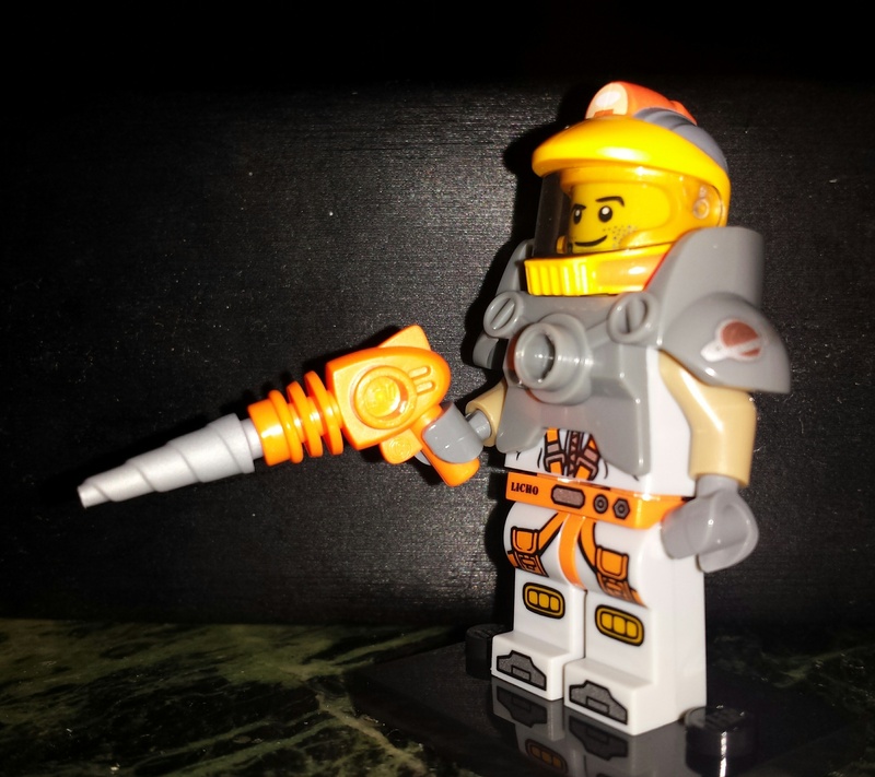 creativity, security, yellow, high angle view, figure, imagination, indoors, toy, plastic, table, transportation, safety, lego, space traveler, toys, art and craft