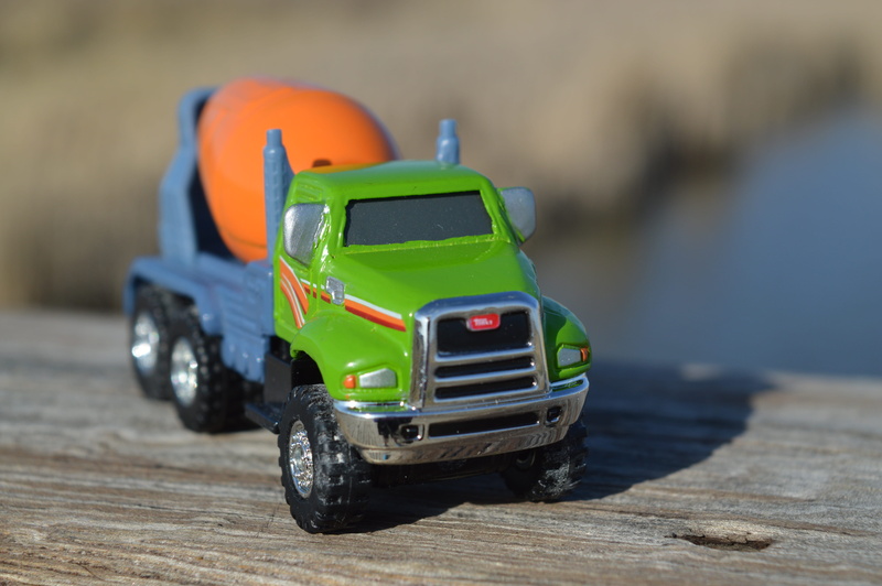 transportation, still life, sport, lorry, sunlight, day, truck, close-up, land vehicle, mode of transportation, tire, 5K, wheel, toy car, machine, toy