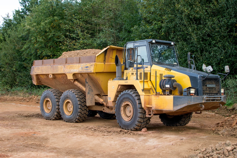 construction equipment, tire, day, road construction, power, machinery, tipper, Vehicle, no people, plant, industry, Dumper, mode of transportation, earth mover