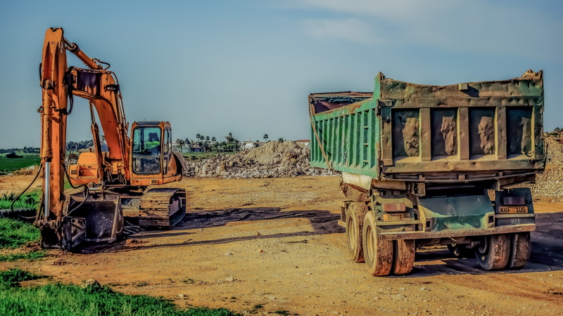 construction equipment, outdoors, run-down, construction machinery, transportation, industry, land vehicle, deterioration, construction site, day, obsolete