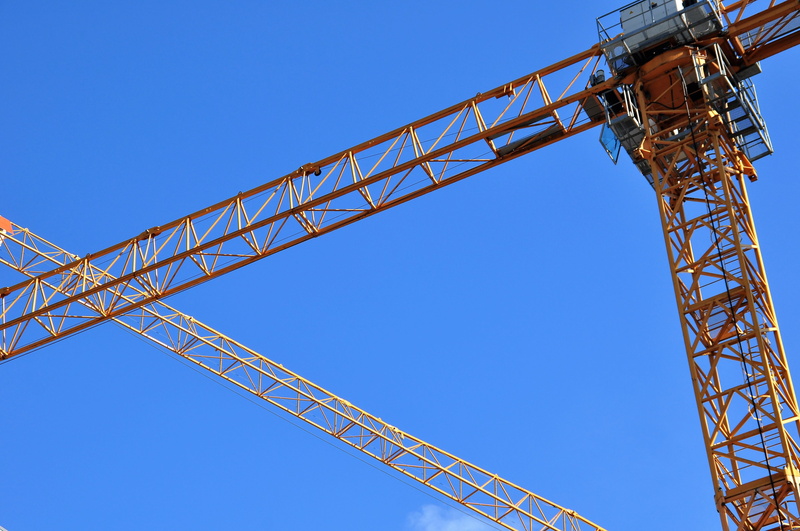 steel, low angle view, arts culture and entertainment, amusement park, nature, clear sky, blue, crane boom, day, construction site, crane - construction machinery