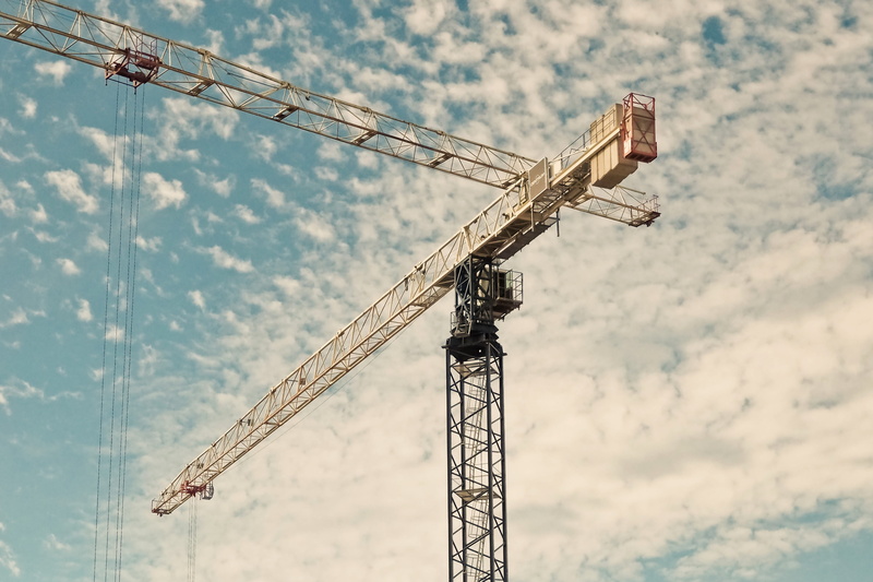 tall - high, construction site, crane boom, building, low angle view, machinery, technology, site, built structure, construction equipment, baukran, lifting crane