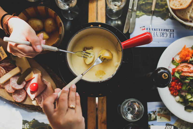 adult, glass, healthy eating, postatoes, hand, household equipment, holding, finger, fork, fondue, women, preparation, sauce, directly above, wellbeing