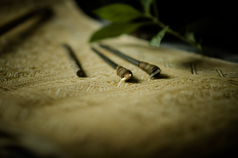 batik, insect, no people, leaf, selective, fabric, close-up, animal, one animal, object, worm, textile, invertebrate, extreme close-up, artist, tool, nature