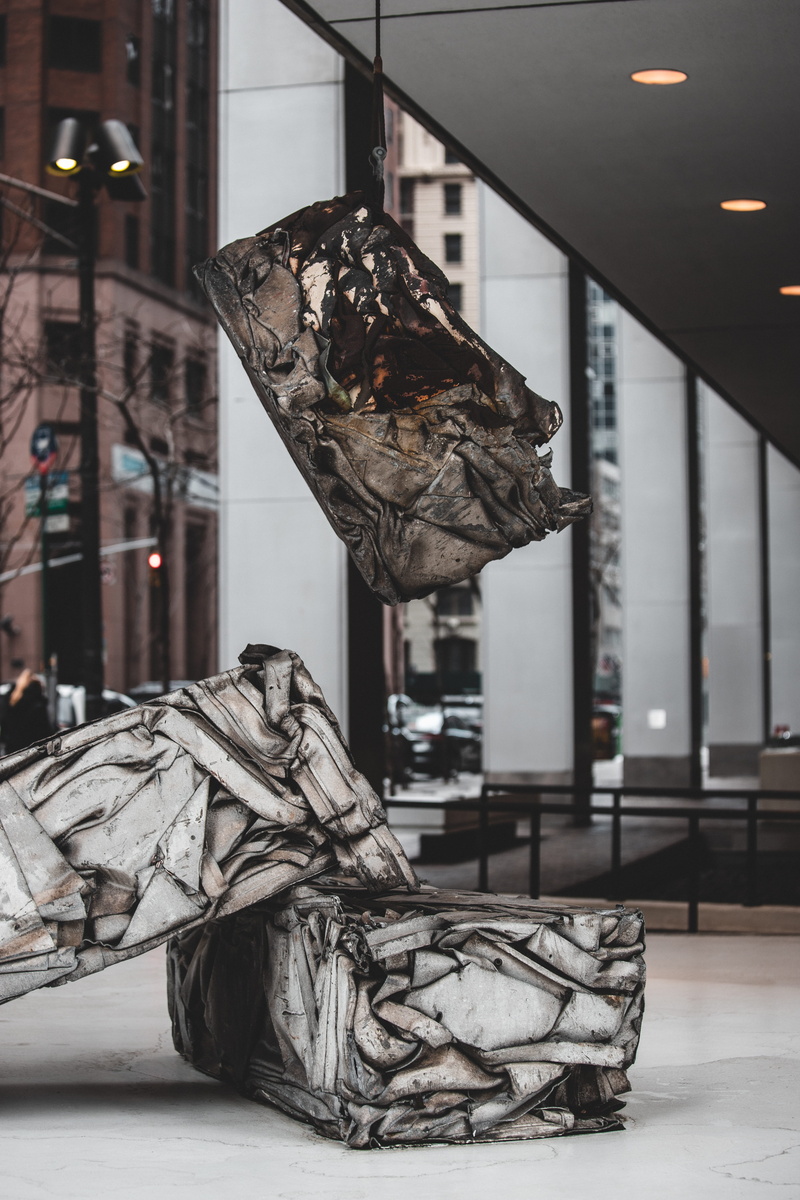 building, compressed, wheel, white, business, ny, floor, built structure, pants, art, indoors, clothing, hanging, 5K, architecture, absence, no people