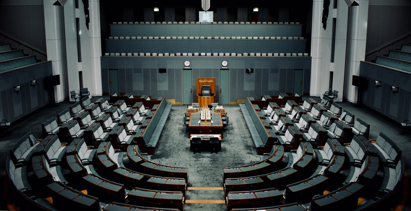 seat, the past, stage, arts culture and entertainment, tables, history, architecture, high angle view, large group of objects, government, repetition, inside