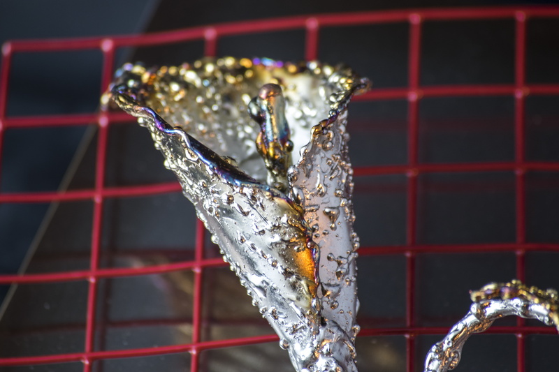 steel, food, sweets, elia clerici, snow, indoors, icicle, sculpture, silver colored, focus on foreground, blacksmit, close-up, art and craft, flower, frozen