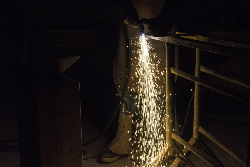 metal industry, heat - temperature, technology, built structure, sparks, motion, no people, factory, metallic, smith, art, industry, dark, flame, elijah clerici