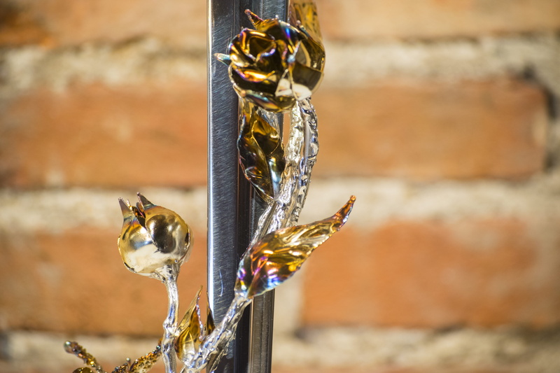 outdoors, animal themes, insect, blacksmith, ielix, sunlight, steel, animal, bricks, animal wildlife, gold colored, close-up, no people, rose, bird, nature