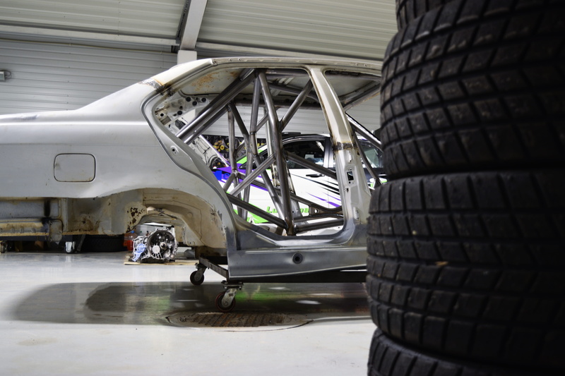 aerospace industry, luxury, sport, repairing, shop, mode of transportation, automotive, land vehicle, engine, motor vehicle, automobile, shopping, garage