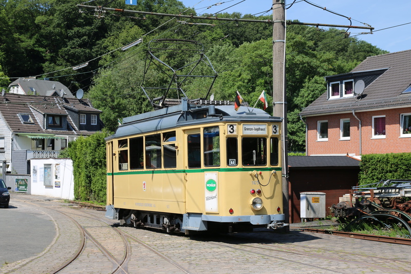 city, street, railroad track, plant, day, mode of transportation, public transportation, built structure, transportation, architecture, museum railway