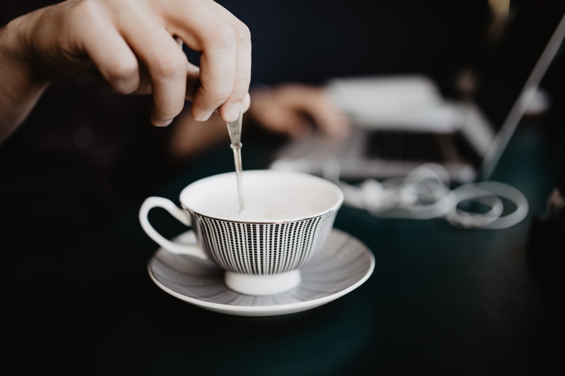 one person, hand, male, coffee - drink, preparation, cup of coffee, holding, coffee cup, laptop, workplace, stirring, hot drink, designer, coffee shop