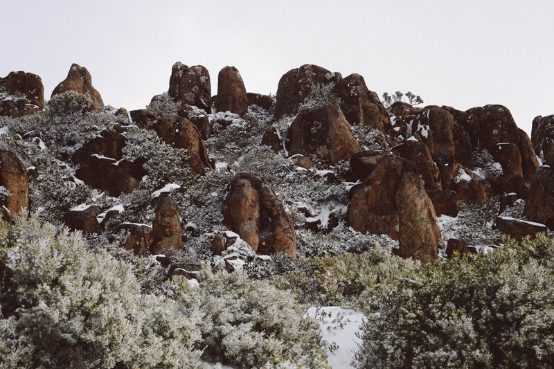 day, rock, sky, low angle view, outdoors, nature, rock formation, cold temperature, tree, non-urban scene, hobart, snow, australia, rock - object, solid