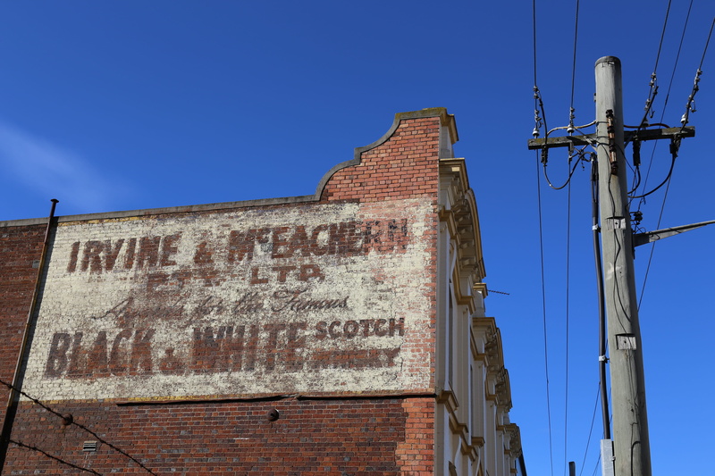 hobart, built structure, telephone line, technology, communication, text, brick, clear sky, building exterior, building, low angle view, message, electricity