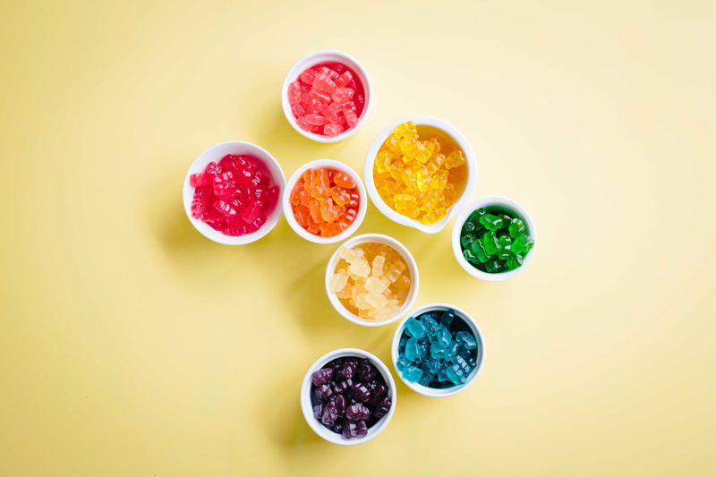 wellbeing, blue, no people, high angle view, orange, sweet, drink, healthy eating, citrus fruit, candy, fruit, jelly, studio shot, choice, green, sweets