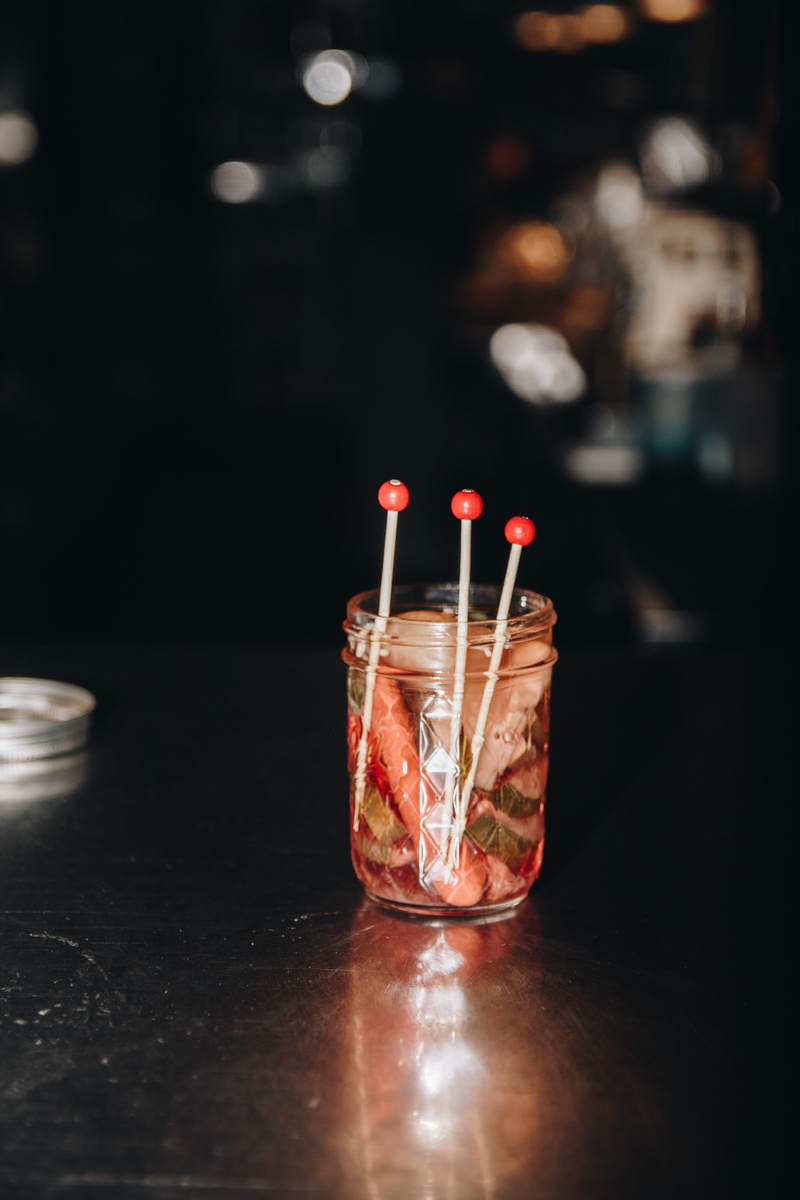 glass - material, drink, fruit, drinking glass, pub, confectionery, sweets, red, no people, alcohol, cocktail bar, indoors, household equipment, table