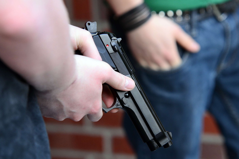 crime, ammunition, children toys, beretta, aggression, people, adult, sport weapon, young adult, gun, communication, human hand, teenager, blank gun, magazine