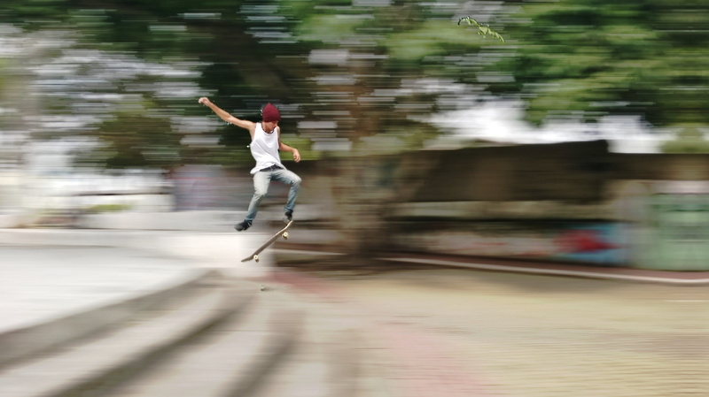 outdoors, human arm, Skateboard, Skater, arms outstretched, jumping, real people, skill, casual clothing, day, blurred motion, women, nature, leisure activity