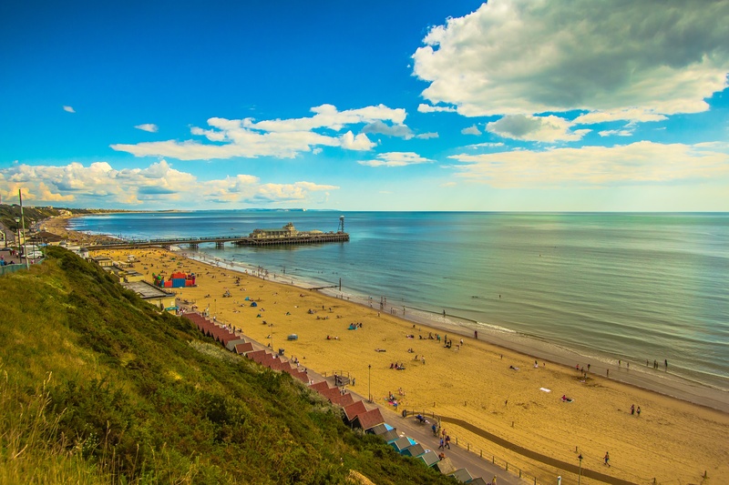 beach, water, near, grass, blue, nature, bournemouth, tranquil scene, sea, sky, beauty in nature, tranquility, cloud - sky, incidental people, idyllic