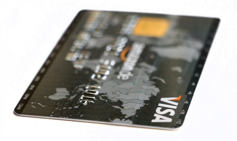 credit card, communication, high angle view, focus on foreground, visa, commerce, computer Chip, black color, white background, business, two objects, shopping