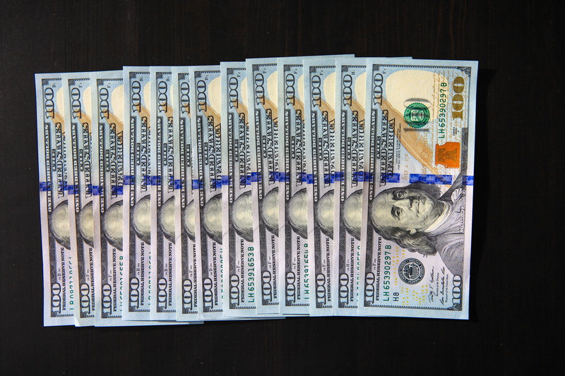 black background, banking, usa, butch, cash, wealth, order, indoors, currency, paper, financial, money, bills, in a row, one, large group of objects, studio shot