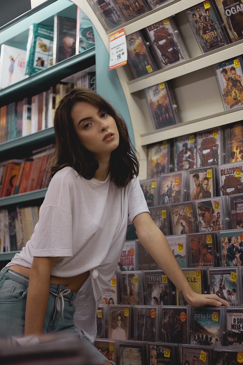 market, hairstyle, rental, casual clothing, indoor, standing, woman, childhood, young women, commerce, option, one person, wear, young adult, teenager