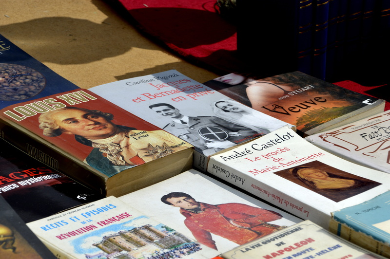 non-western script, old, script, choice, market, representation, female likeness, balances, sale, still life, indoors, stories, flea market, high angle view