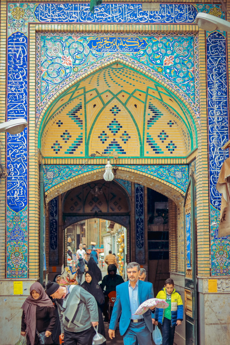 building, pattern, mural, blue, building exterior, day, temple, group of people, architecture, entrance, adult, arched, flagstone, people, art, spirituality