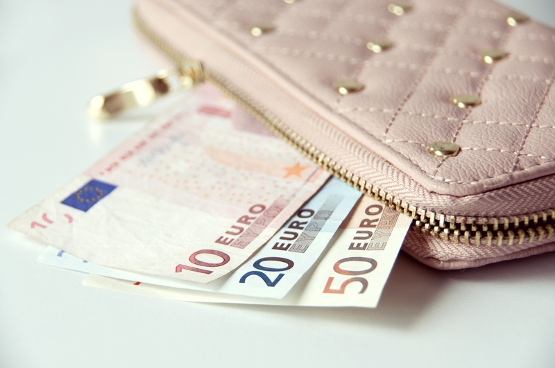 business, banknotes, wealth, wallet, medium group of objects, colored background, economy, indoors, currency, paper currency, finance, clothing, money