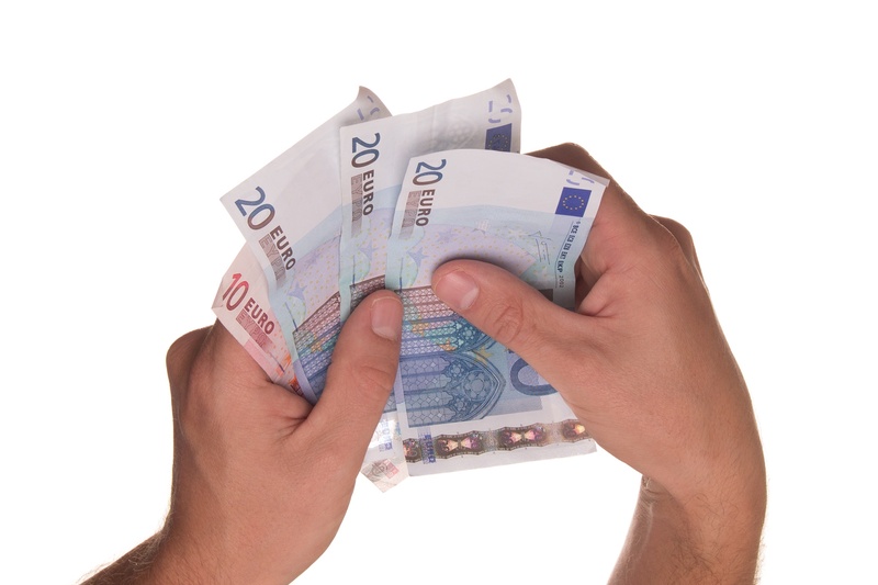 cut out, close-up, holding, financing, borrowing, indoors, banking, person, economy, businessman, white background, finance, shopping, men, banknote, cash