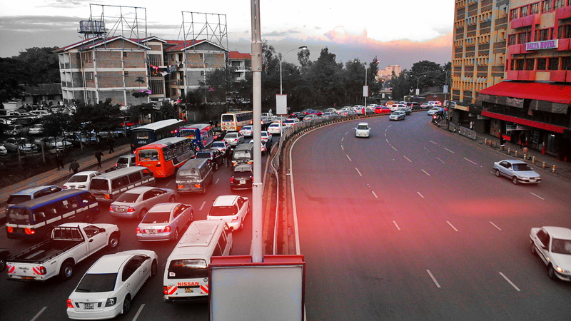 motion, outdoors, traffic Jam, architecture, sky, urban Scene, land vehicle, multiple lane highway, high angle view, travel, on the move, public domain