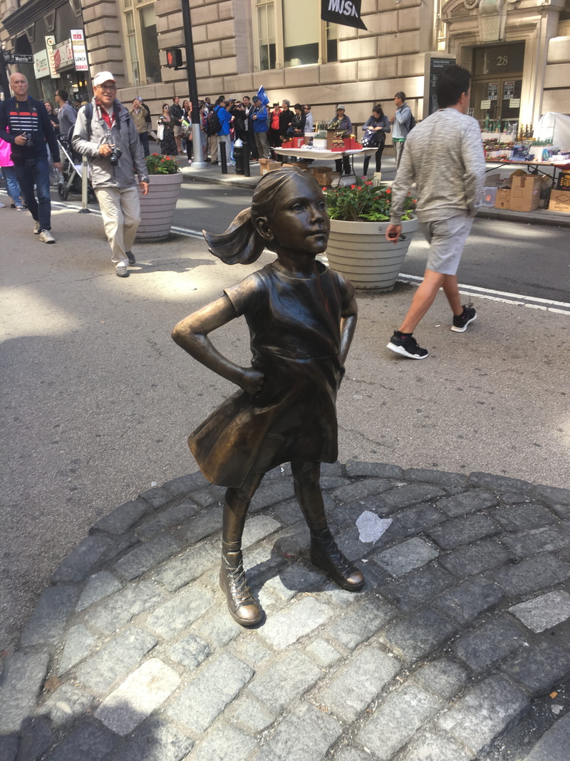 courageous, intrepid, city life, group of people, lifestyles, art, adult, strong, built structure, incidental people, people, leisure activity, Girl, footpath