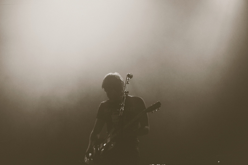 lifestyles, standing, 4K, guitarist, black and white, sing, lights, arts culture and entertainment, skill, man, microphone, playing, concert, enjoyment