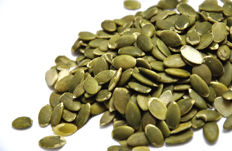 green color, stack, freshness, bean, indoors, pumpkin seeds, healthy eating, no people, lot, still life, studio shot, healthcare and medicine, wellbeing
