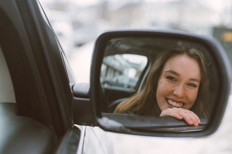 one person, adult, 4K, smiling, refection, motion, journey, vehicle, land vehicle, side-view mirror, car, side mirror, transportation, looking, road, woman