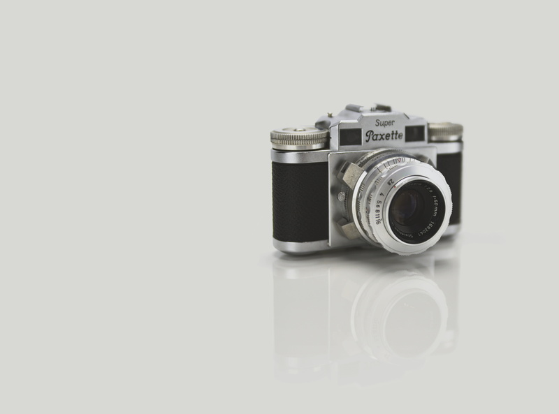 point, lens - optical instrument, black, shoot, gray, no people, white, paxette, 35mm, photographing, antique, cut out, camera, 50mm, activity, still life