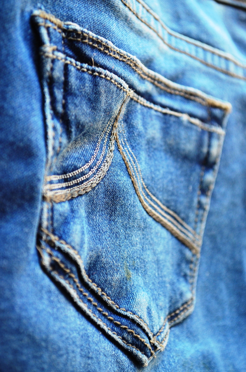 body part, backgrounds, close-up, design, seam, blue, torn, material, indoors, pants, cloth, 4K, apparel, pocket, fabric, clothing, jeans, clothes, denim