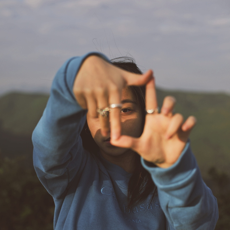 human hand, portrait, bandage, human, lifestyles, apparel, rings, looking at camera, hand, headshot, finger, light, day, first aid, sweater, control tower