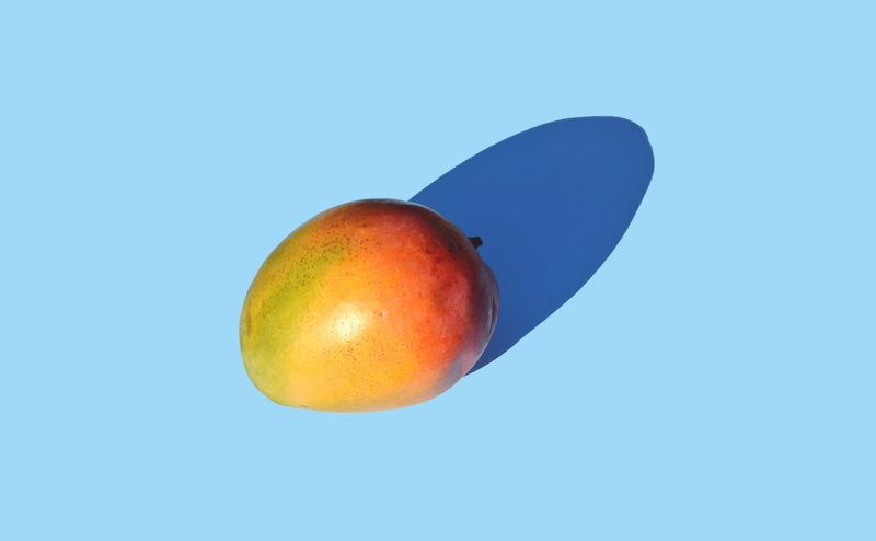 minimal, blue background, freshness, portland, close-up, color, mango, indoors, cut out, red, copy space, studio shot, united states, nature, colored background
