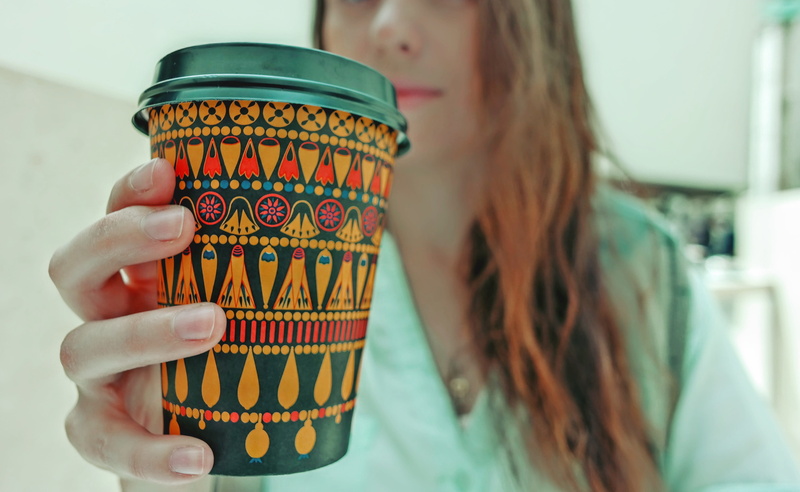 coffee, drink, british museum (stop w), indoors, hand, close-up, food and drink, cup of coffee, food, holding, lifestyles, london, finger, black and yellow