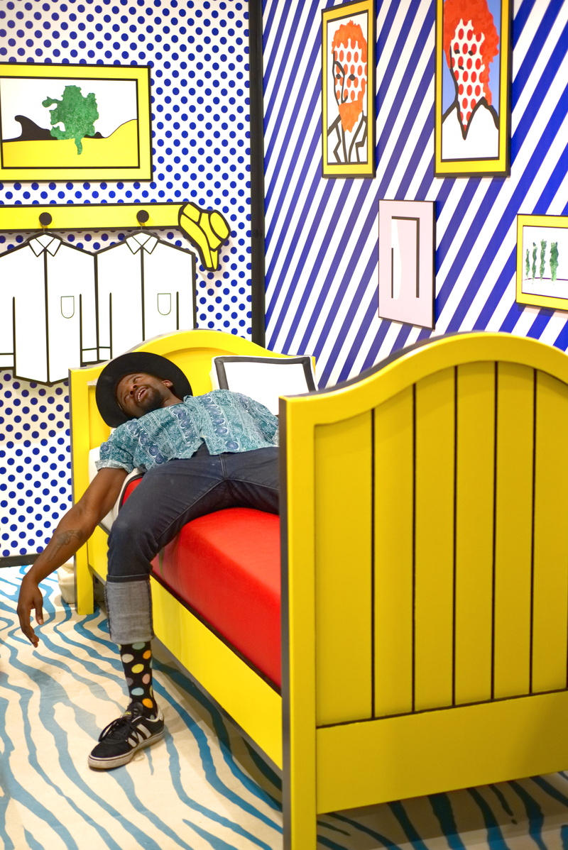 side view, full length, yellow, interior, stylish, real people, communication, sleeping, jeans, laying, bright, seat, paper, day, fake, african american