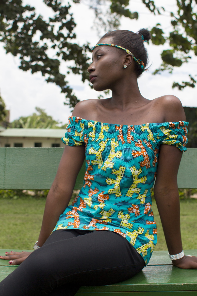 young adult, one person, nature, sitting, lady, fabric, 5K, sunglasses, three quarter length, focus on foreground, day, hairstyle, lifestyles, looking away
