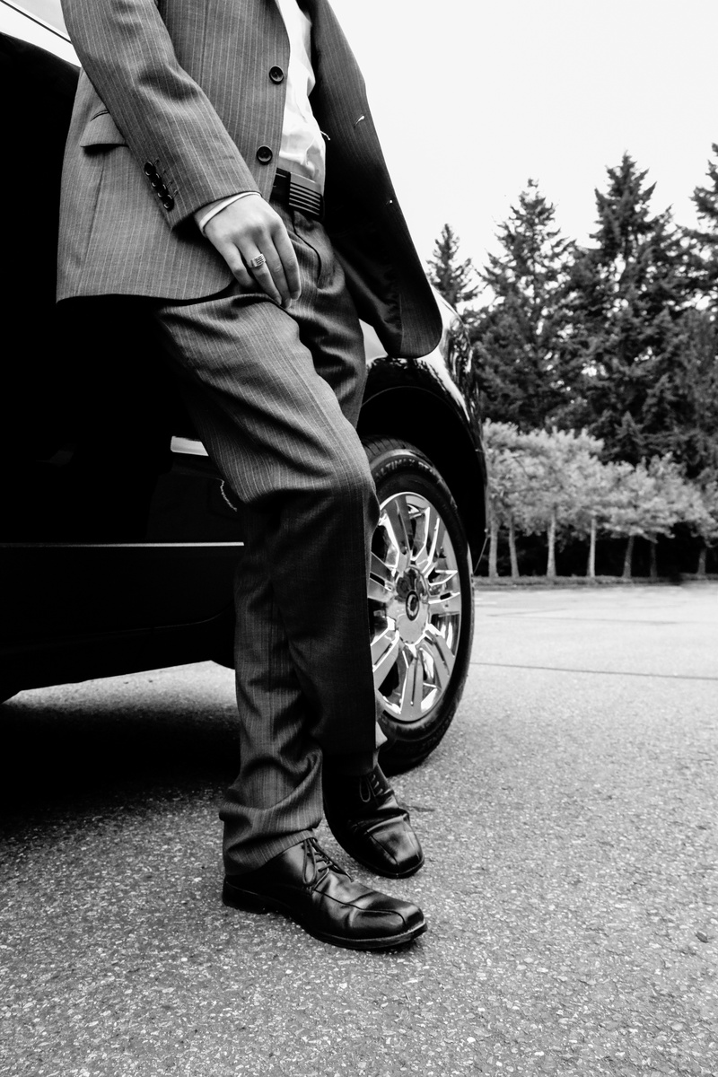 modern, cadillac, black And White, person, lifestyles, mode of transportation, man suit, wheel, human limb, black, man in suit, tire, tree, casual clothing