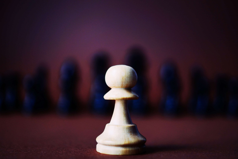 still life, strategy, arts culture and entertainment, focus on foreground, conceptual, challenge, pawn - chess piece, chess, king - chess piece, blur, no people
