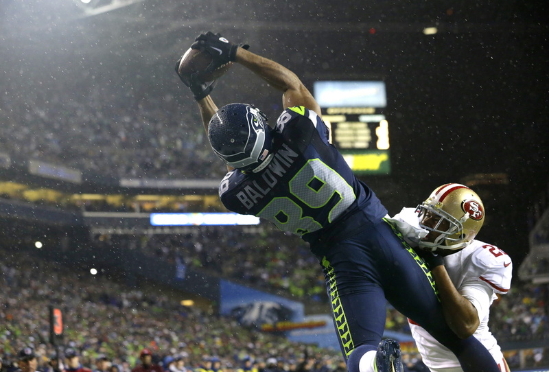 motion, american football player, athlete, football, seahawks, stadium, people, american football - sport, outdoors, sport, crowd, two people, competition