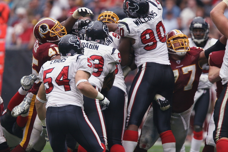 stadium, american football - sport, group of people, muscular, confrontation, emotion, teamwork, jumping, celebration, american, uniform, professional